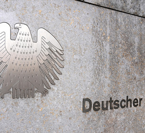 Berlin, Germany - November 03, 2022: The German Bundestag (Deutscher Bundestag) logo on Eingang Wilhelmstraße bulding. Deutscher Bundestag