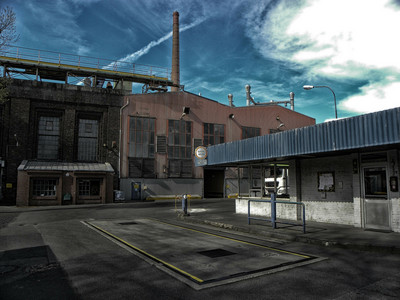 Das Bild zeigt den Eingangsbereich einer Fabrik