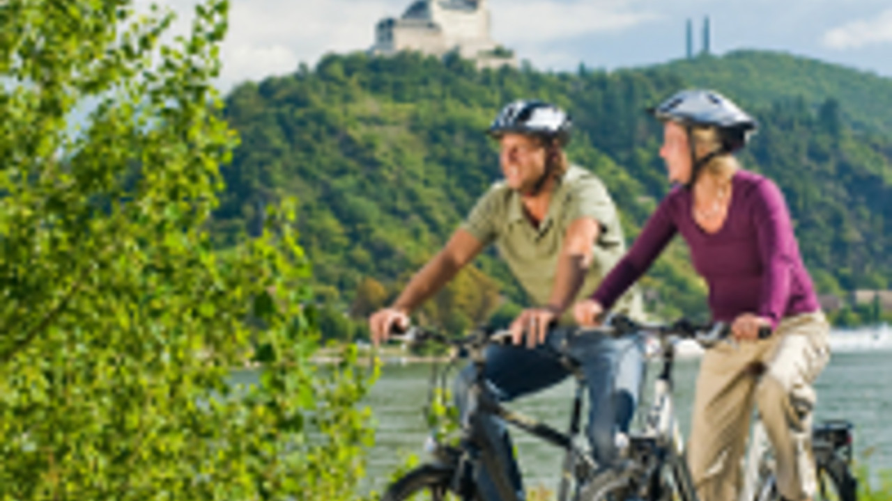 Radfahrer am Rhein, Foto: Dominik Ketz/Rheinland-Pfalz Tourismus GmbH Radfahrer am Rhein, Foto: Dominik Ketz/Rheinland-Pfalz Tourismus GmbH